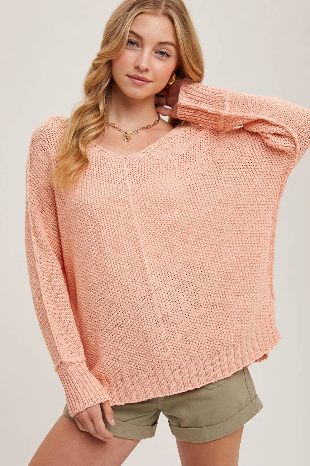 REVERSE SEAM LOOSE FIT SWEATER